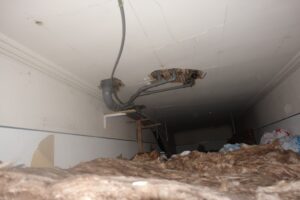 Ceiling void fire compartmentation issue