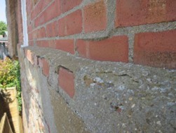 listed building survey cement