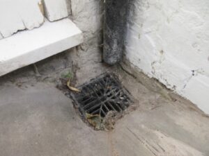building surveyor birmingham finds downpipe problem