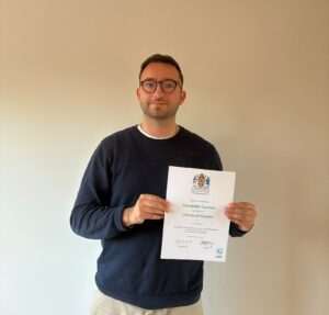 Alex Lawson gets his MCABE certificate